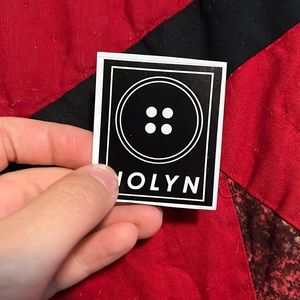 Jolyn Black Button Sticker